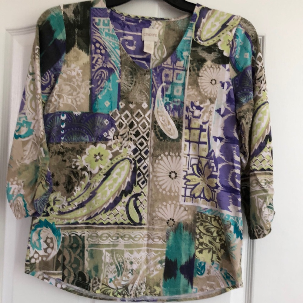 Chico’s multi-colored top size 0. 3/4 sleeves